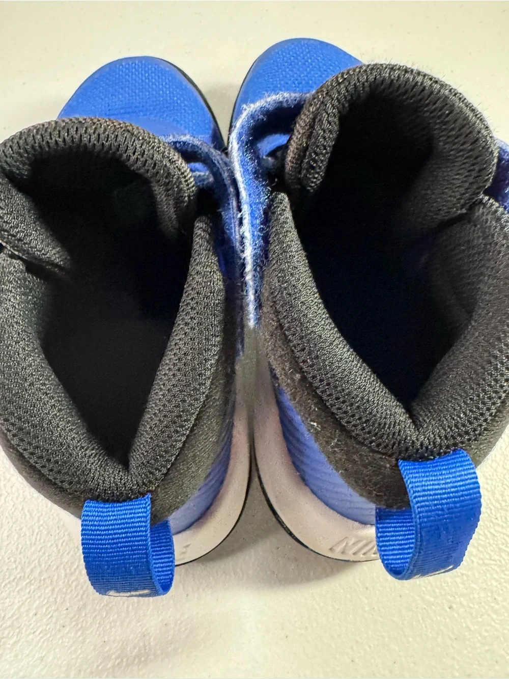 Nike Team Hustle Kids' High-Top Sneakers in Royal Blue and Black